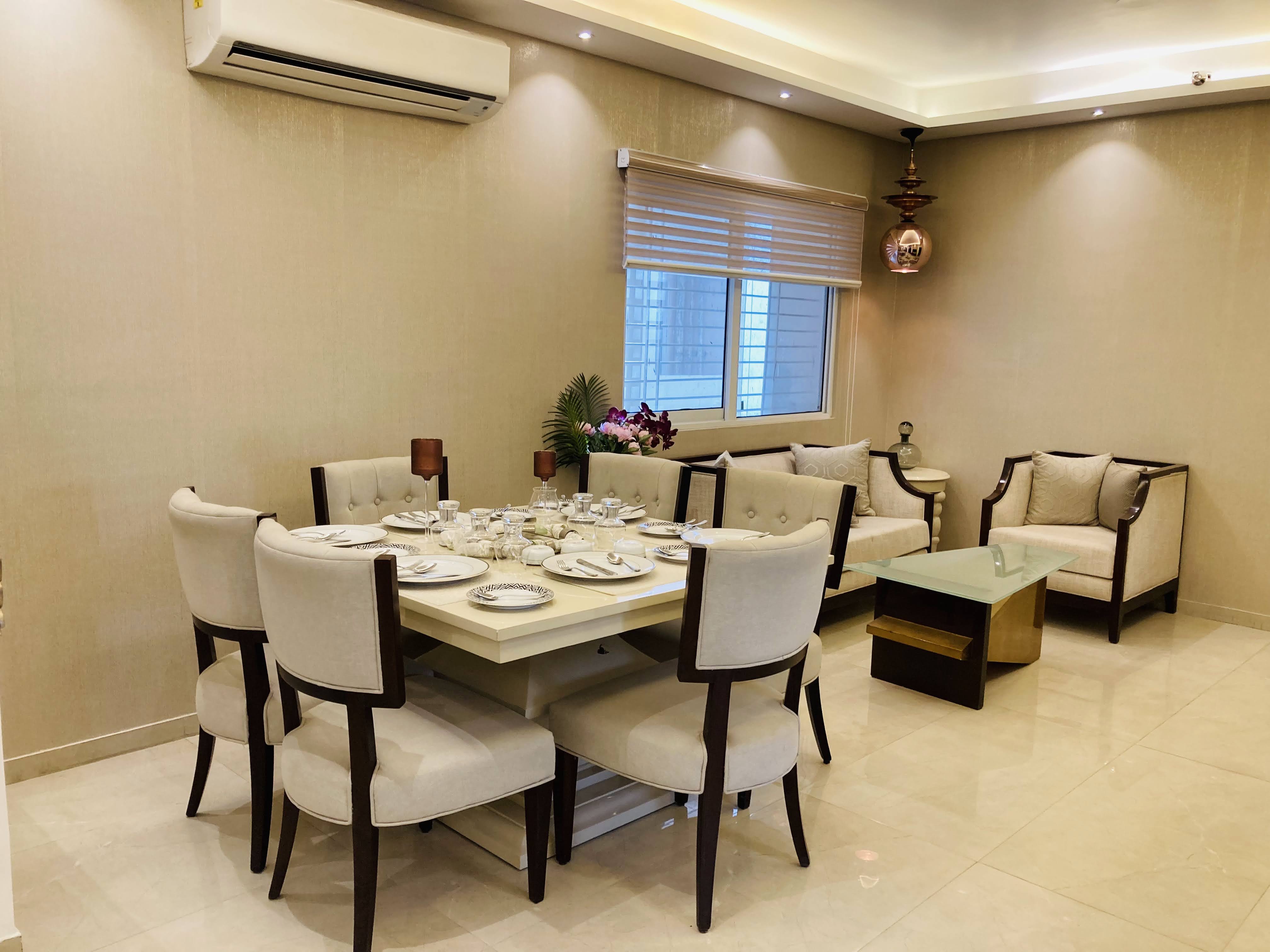 Elite Golf Green — Elegant dining area with sophisticated lighting